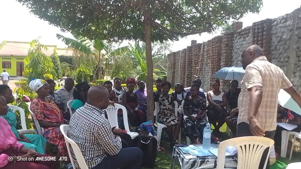 MOVFACOS members undergoing cooperative governance training by DCO Mr. Simon Kasereka, Kasese Uganda