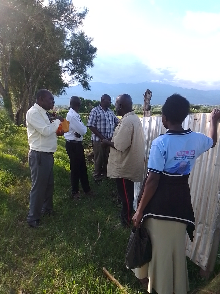 OWC Coordinator Bukonzo County visiting MOVFACOS projects for possible financial funding under Operation Wealth Creation, Kasese Uganda