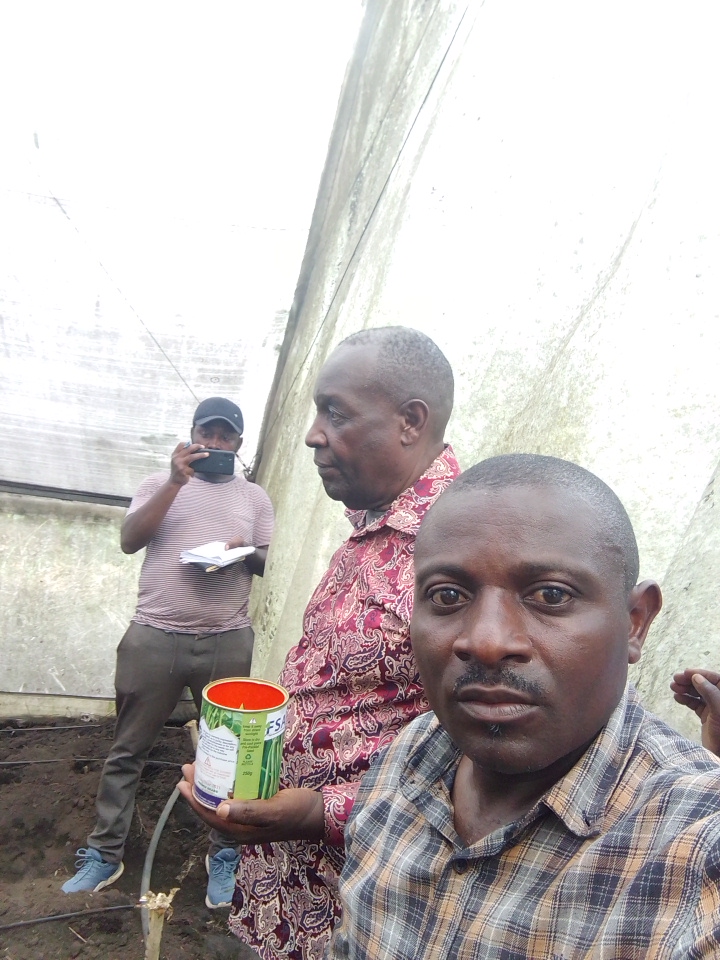 Brigadier General Philip Mugarura OWC Regional Coordinator Rwenzori visiting MOVFACOS greenhouse projects, Kasese Uganda